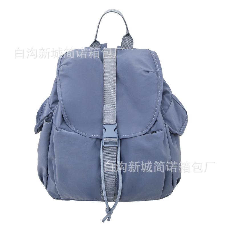 2025 spring new solid color college student backpack women's outdoor leisure large capacity simple high value backpack men