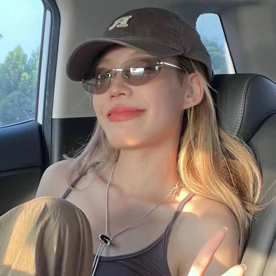 Retro European and American Style Frameless Oval Sunglasses for Women, UV Protection and Sunshade.