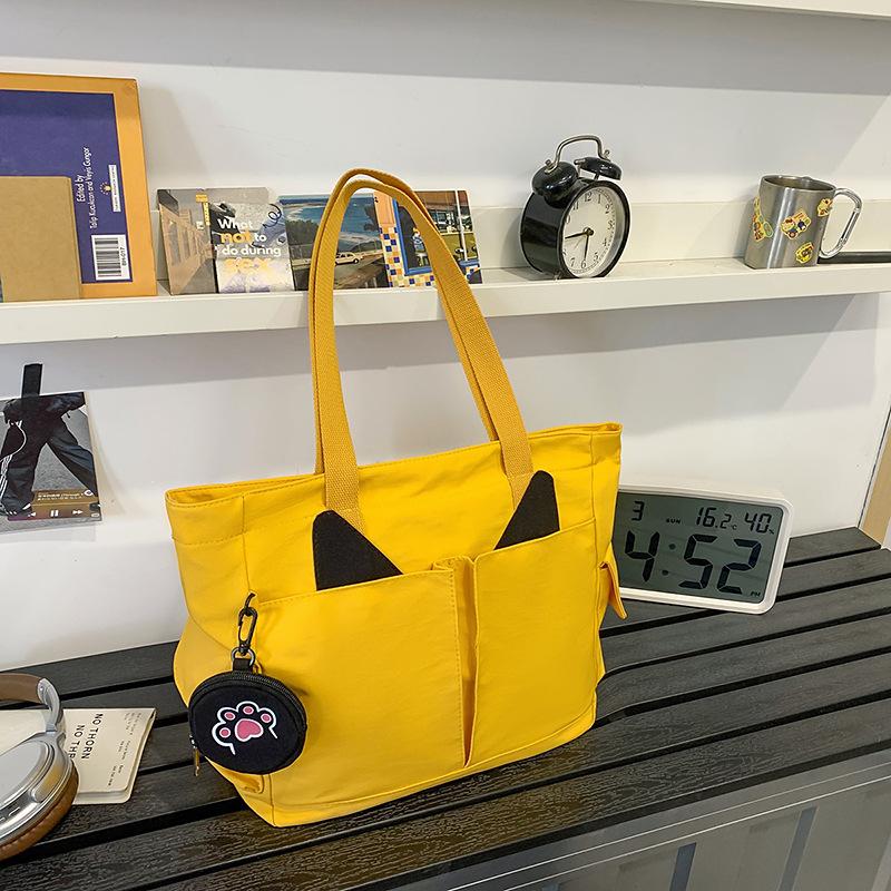 

Модный тренд повседневная текстура простая большая вместимость сумка 2025 весна новая зарубежный стиль женская на плечо тоут жёлтый