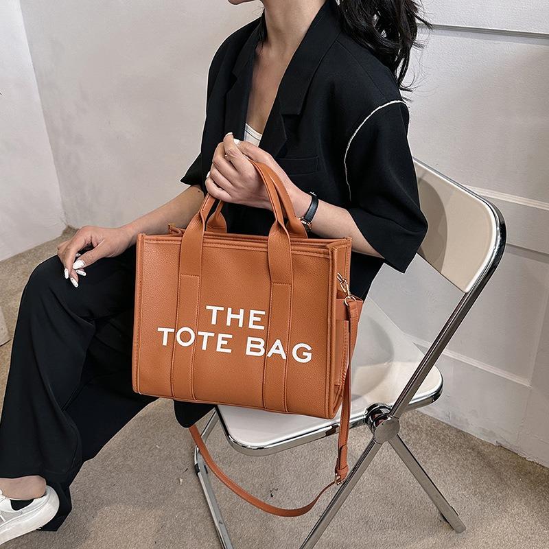 New women's bag women's new solid color pu letter tote bag simple casual messenger large capacity portable
