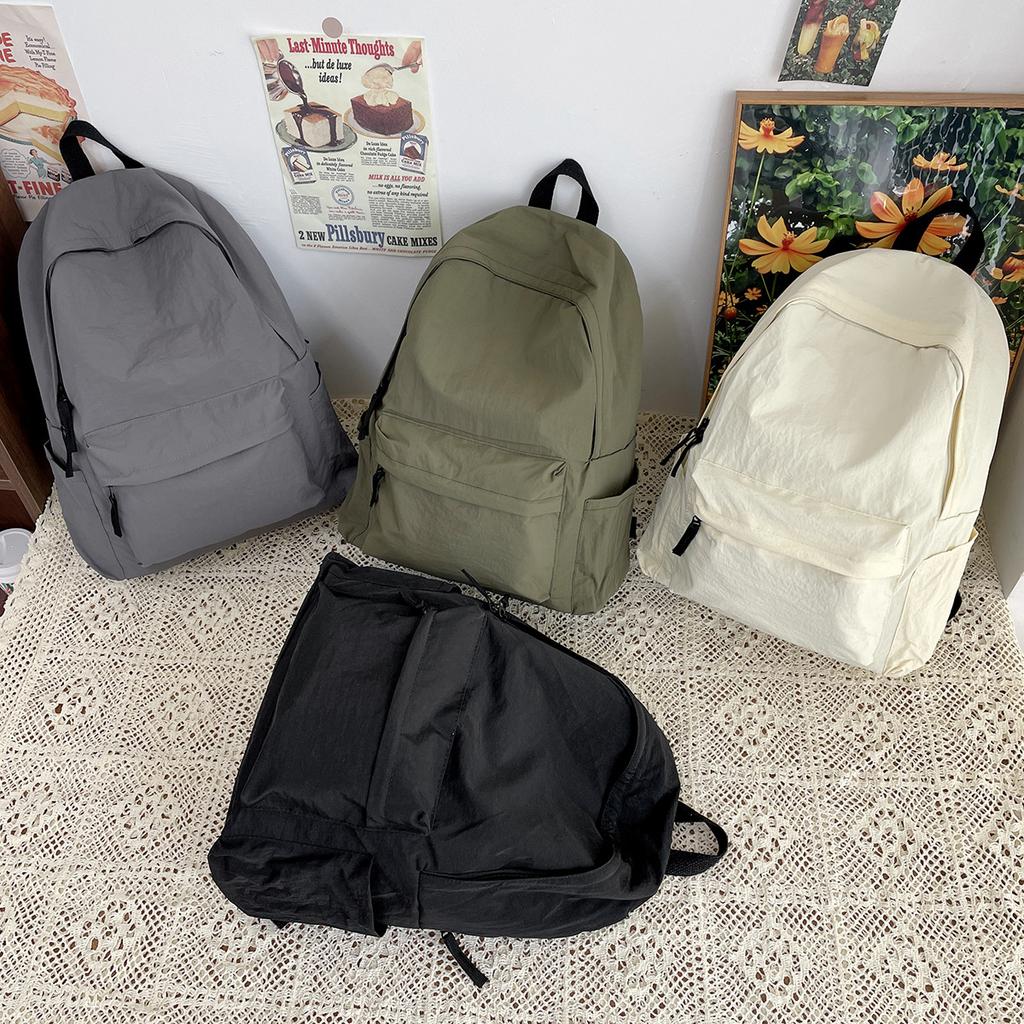 Japanese solid color schoolbag male college student versatile simple travel backpack female high school student large capacity computer backpack
