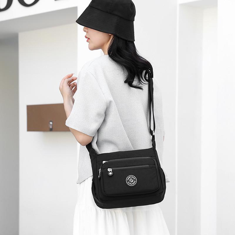 Waterproof Nylon Shoulder Bag For Women With Soft Structure And Inner Zipper Pocket