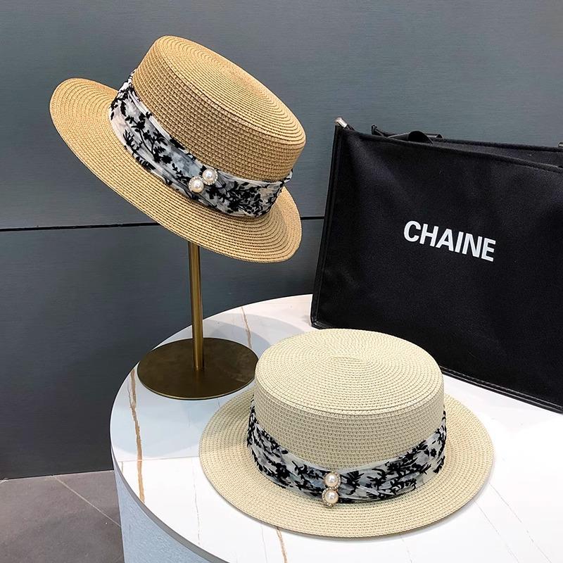 Straw hat women's summer beach seaside vacation sunshade sunscreen hat straw temperament flat top top hat new sun hat