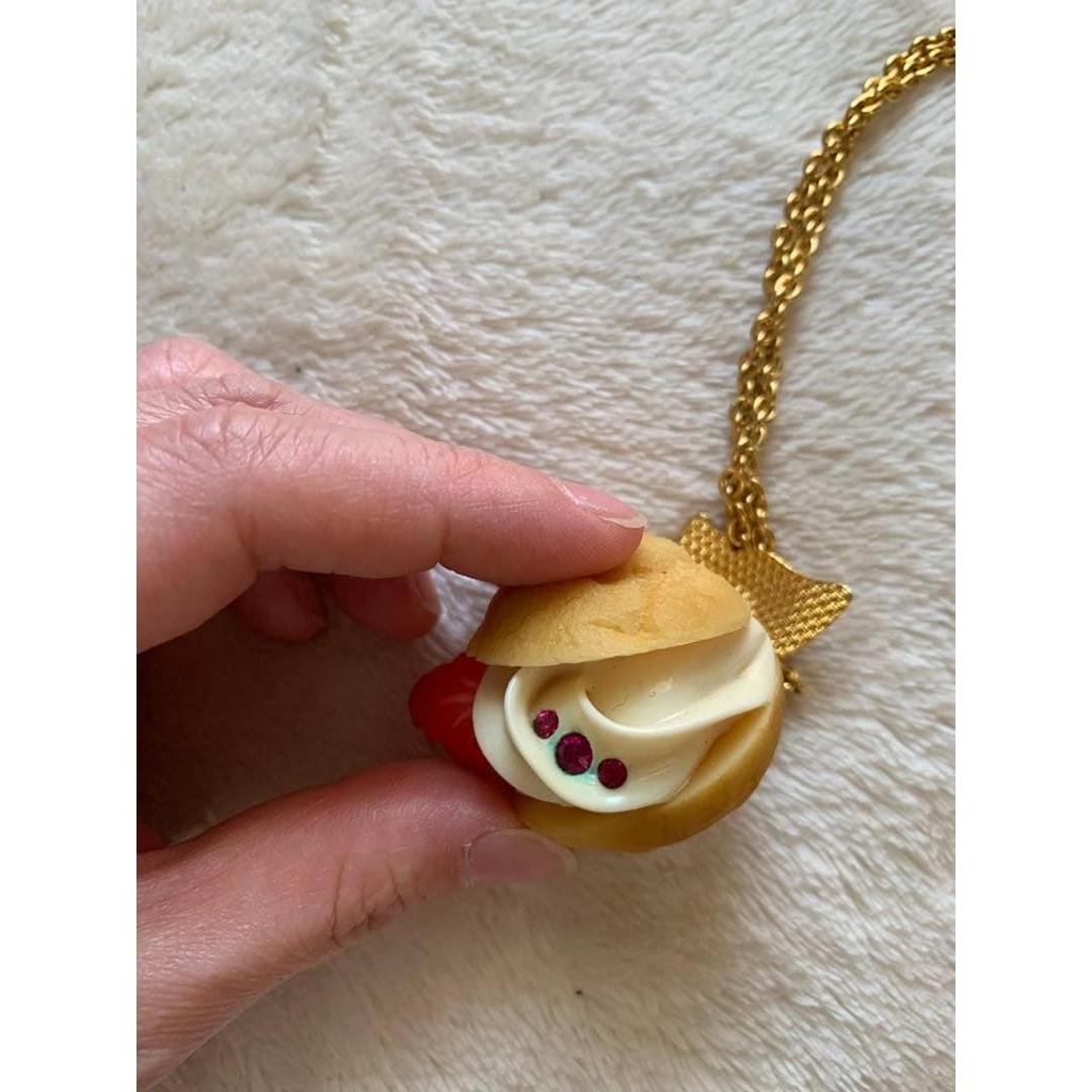 Used Q-pot.Ribbon cream puff necklace