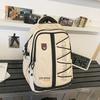 High-value retro tooling trendy and cool backpack for junior high school students, casual, simple, lightweight and large-capacity backpack.