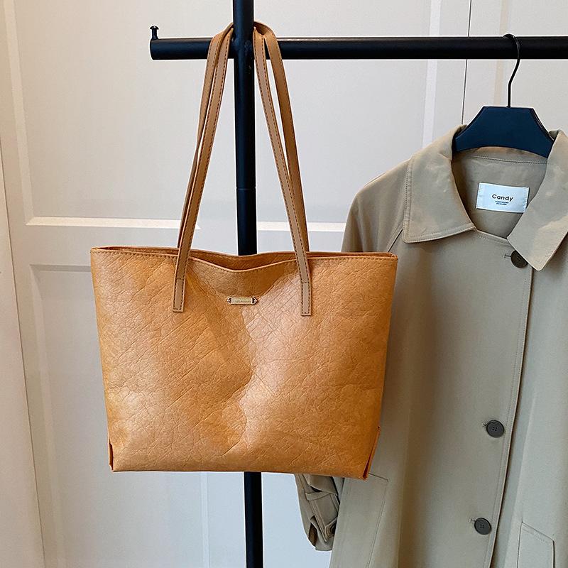 

2025 новая летняя сумка-тоут премиум-класса для ежедневных поездок на работу, женская, большой вместимости, простая, портативная, на плечо