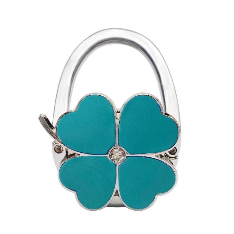 

Шкіряний гачок для сумки у вигляді конюшини однотонного кольору