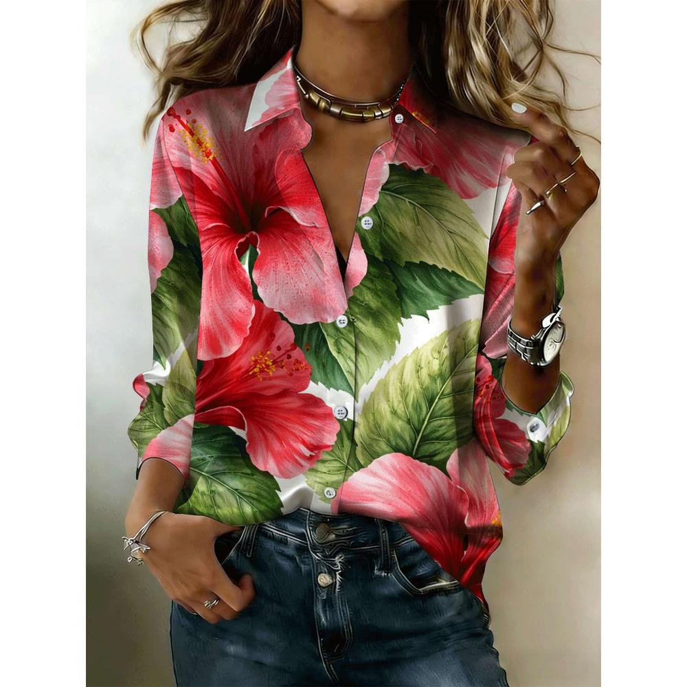 Women's shirt, featuring a vibrant tropical floral design, with long sleeves and button closure, is perfect for beach vacations and casual outings.