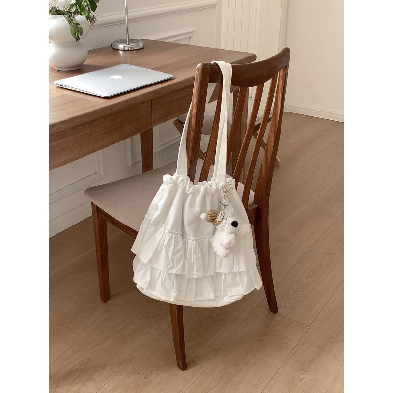 

Новая плиссированная сумка-тоут с рюшами, для поездок на работу, ветрозащитная, с высоким чувством стиля, большой вместимости, женская, с кулиской, нишевый дизайн, на плечо, женская бежевый