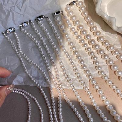 Boucle lingot collier de perles chaîne clavicule légère de luxe pour femmes populaire 2025 assortiment