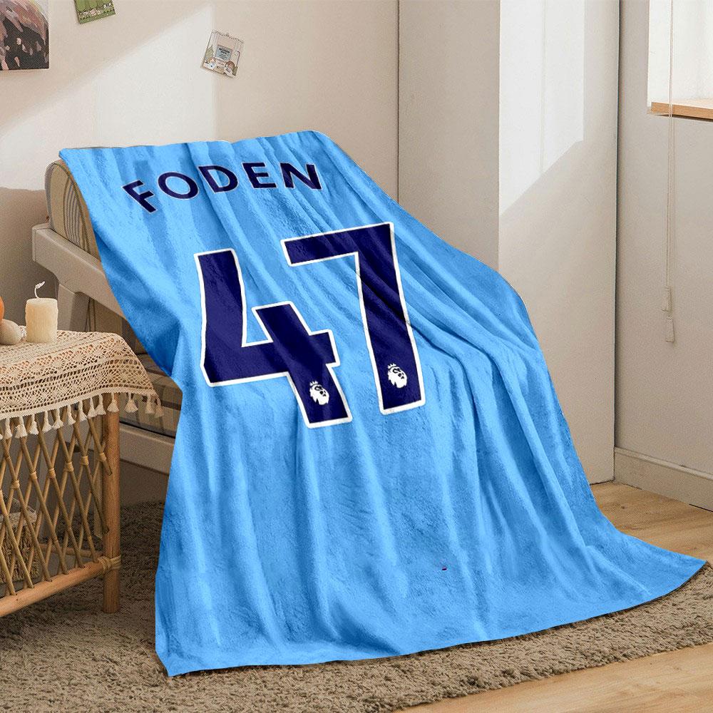 Blue background with "FODEN" and large navy "47" outlined in white. for all seasons blanket lunch break throw gift