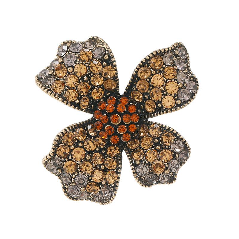Niche design retro exquisite champagne crystal flower brooch temperament high-end corsage pin women's suit accessories trend