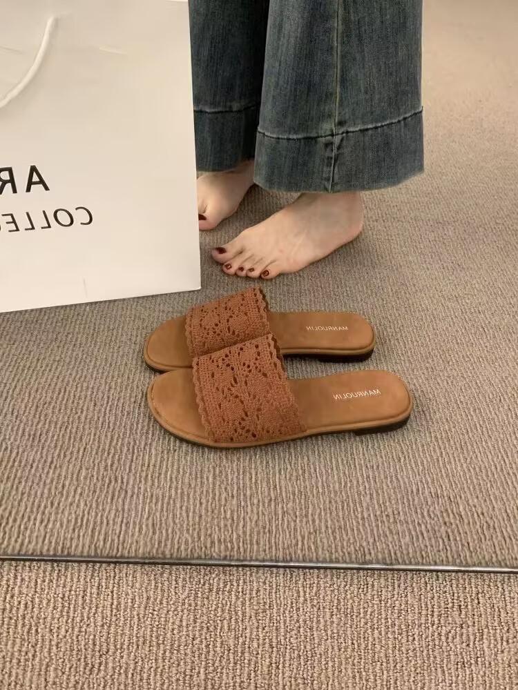 

2025 summer new hollow lace flat-bottomed slippers women s simple solid color one-word drag casual women s cool slippers 40