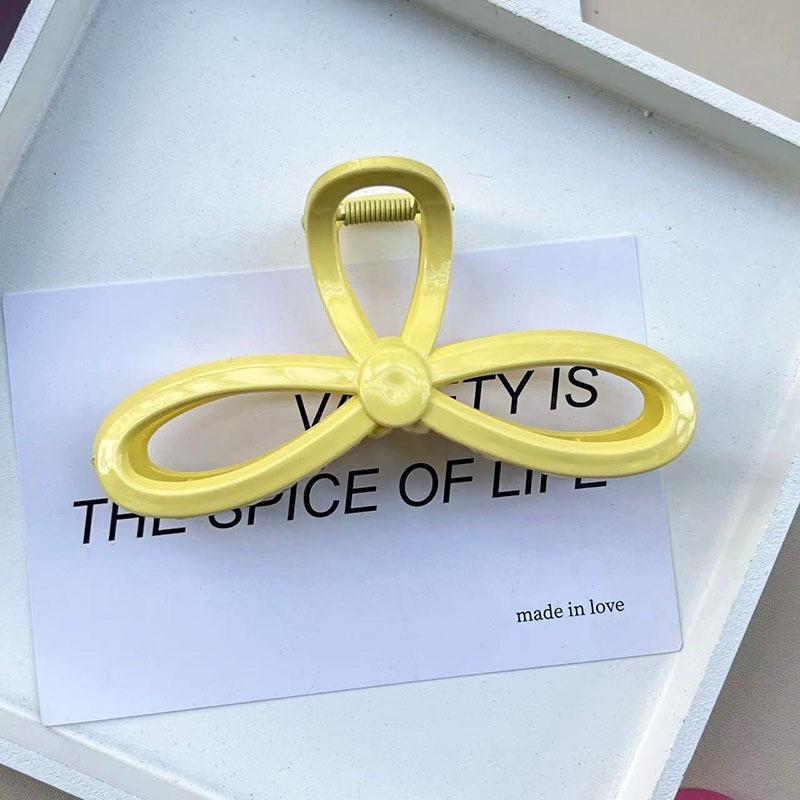 Barrette à cheveux style ins avec grande capacité et design élégant en forme de nœud