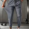 Oddychające Spodnie Dresowe Męskie Plus Size Casualowe dla Mężczyzn Spodnie do Treningu Szybkoschnące Proste Elastyczny Pas Koreański Klasyczny Sportowe