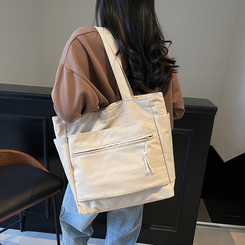 New Large-capacity Business Commuting Fashion New Large-capacity Soft Surface Solid Color Canvas Shoulder Bag
