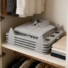 Organización y almacenamiento en el hogar – Tablas para doblar ropa