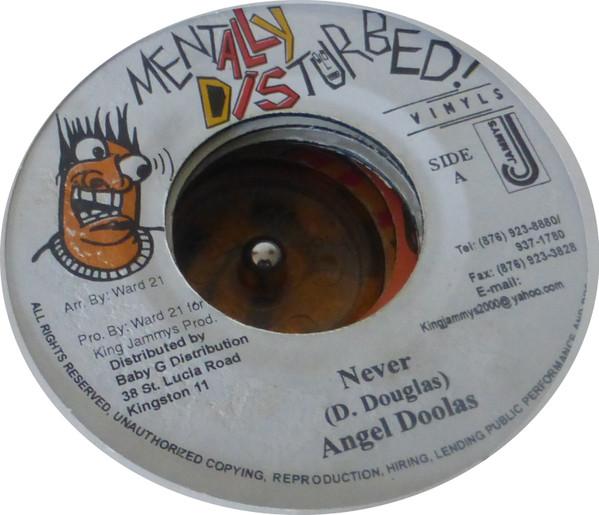 

7inch Record ANGEL DOOLAS - Never NONE Mentally Distur Jamaica Reggae, Ska & Dub Used