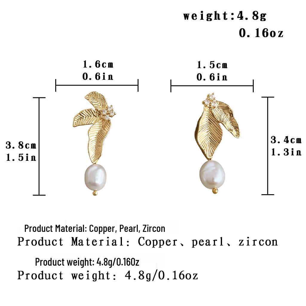 

Asymmetrical Pearl & Palm Leaf Stud Earrings - Elegant and Versatile Jewelry.