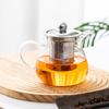 High-Quality Borosilicate Glass Tea Set: 5-Piece Heat-Resistant Kit with Tea Infuser and Separate Flower Tea Filter for Home Use.