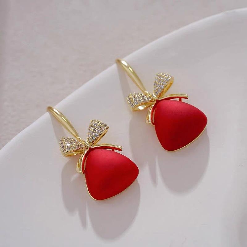 Chinese style red festive lucky bag bow earrings women's niche light luxury fashion earrings high-end earrings