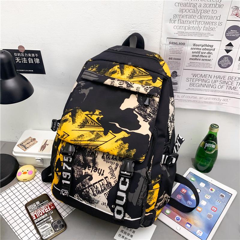 Autumn new fashion schoolbag female personality camouflage graffiti couple backpack large capacity student backpack male