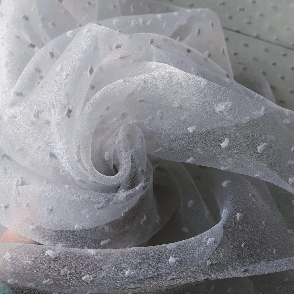 Soft bubble yarn and fluffy organza fabric can be used for wedding dresses evening gowns and designer clothing fabrics