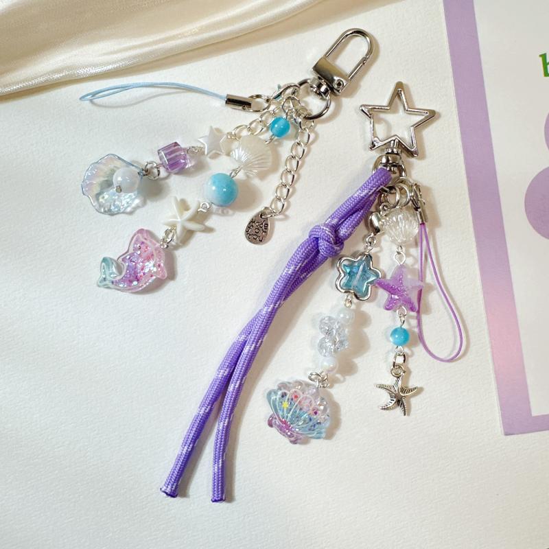 Süße Lila Muschel Stern Delfin Schlüsselanhänger Perlen Schlüsselanhänger Handy Kette Rucksack Tasche Anhänger Charme Auto Schlüssel Dekoration Zubehör