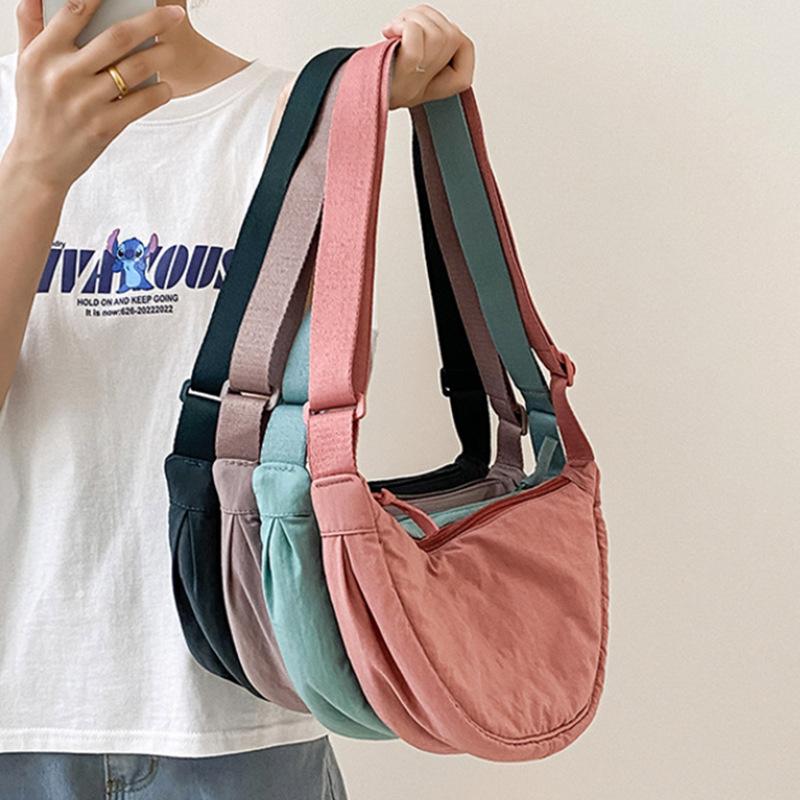 Large capacity niche casual nylon dumpling bag for men and women, student shoulder bag, new women's bag