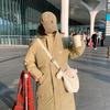 This year, long down cotton clothes in the popular college style are thick and loose in winter, and the cotton-padded jacket is trendy.
