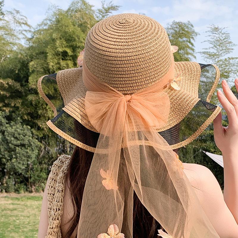 Straw hat women's summer seaside big brim sun hat new outdoor travel leisure wave three-dimensional flower streamer sun hat