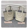 2026 New Togo First Layer Cowhide Pig Nose Vegetable Basket Bucket Bag Simple Temperament Large Capacity Portable Women's Bag