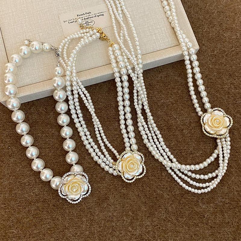 Diamond-encrusted flower multi-layer pearl necklace French retro temperament versatile collarbone chain light luxury high-end sweater chain women