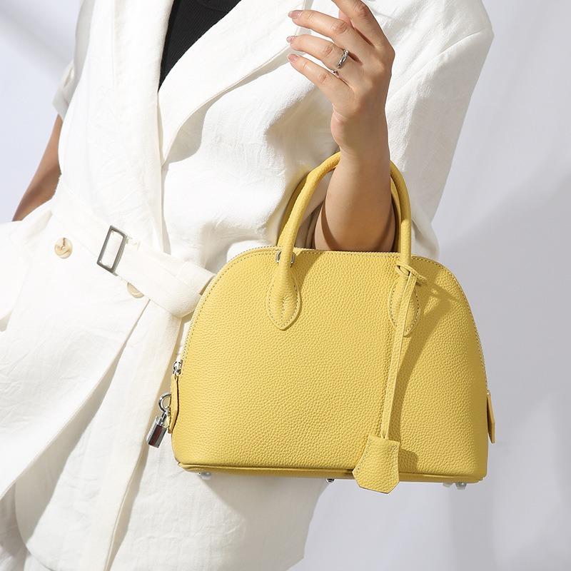 

Легкая роскошь, нишевая, большая вместимость, сумка-боулинг, высококачественная натуральная кожа, кроссбоди, женская сумка, сумка-ракушка One Size жёлтый