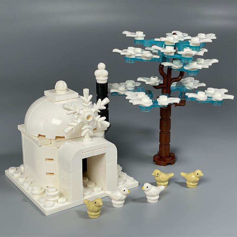 Beleuchtetes arktisches Tier-Baustein-Set: Pinguin, Eisbär, Husky & Wolf Iglu.