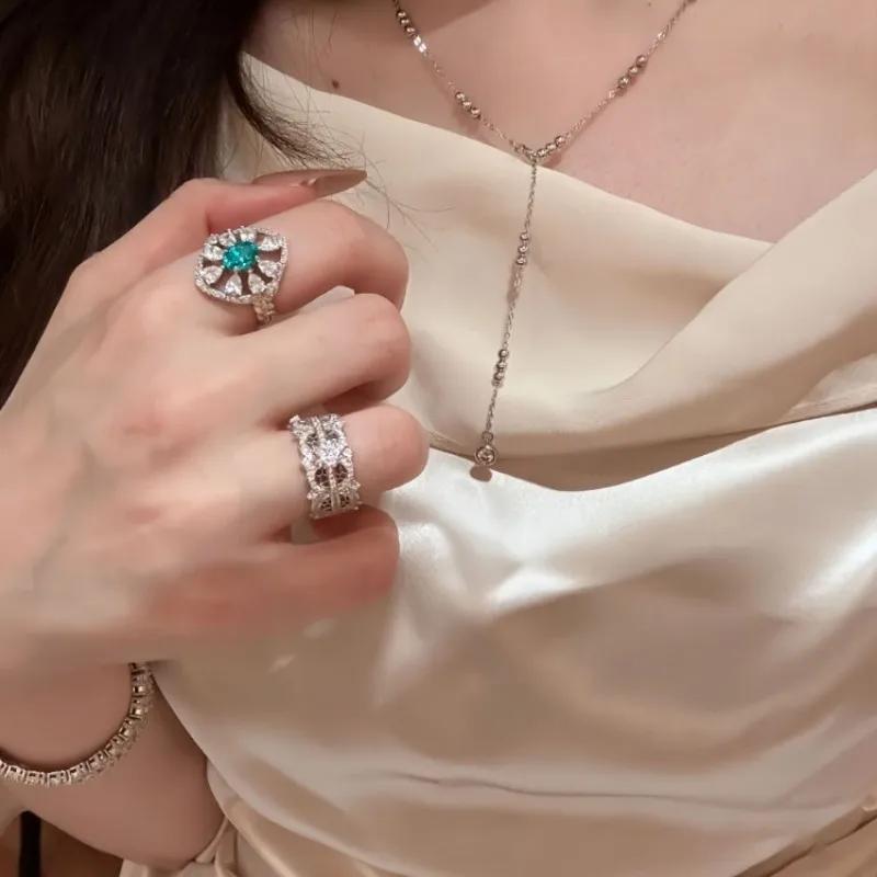 Light Luxury High-end Paraiba Hollow Rings for Women Inlaid Crystal Water Droplet Oval Blue Ring Wedding Jewelry Gift