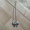 Used carmelo BIG BOW NECKLACE ribbon necklace