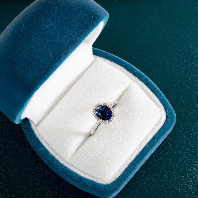 BELLA BOX Klassischer Damenring mit ovaler Form, blauen Edelsteinen, Zirkon, silberfarben, Finger, Hochzeit, Verlobung, Brautschmuck