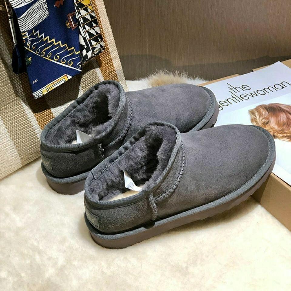 Fashion snow boots, genuine women's boots, broken size withdrawal processing, winter sheepskin and fur integrated flat-bottomed warm short cotton boot
