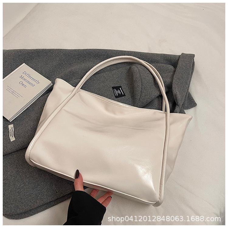 

Сумки большой вместимости, женские универсальные 2025 новые модные и простые повседневные сумки через плечо, популярные сумки-тоут для поездок на работу в этом году