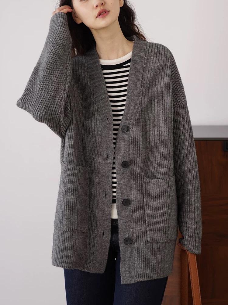 Premium solid color v-neck pocket sweater jacket women's autumn and winter 2026 new loose lazy wind knitted cardigan thick