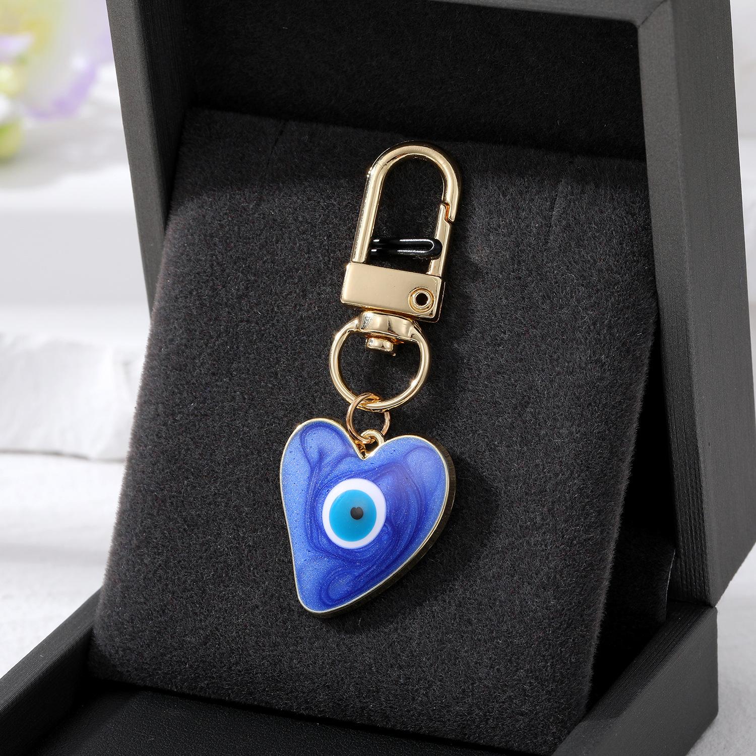 

Turkish Heart Evil Eye Enamel Pendant Keychain Blue Eye Keyring Fashion Accessory for School Bag Car Jewelry 1Piece синій
