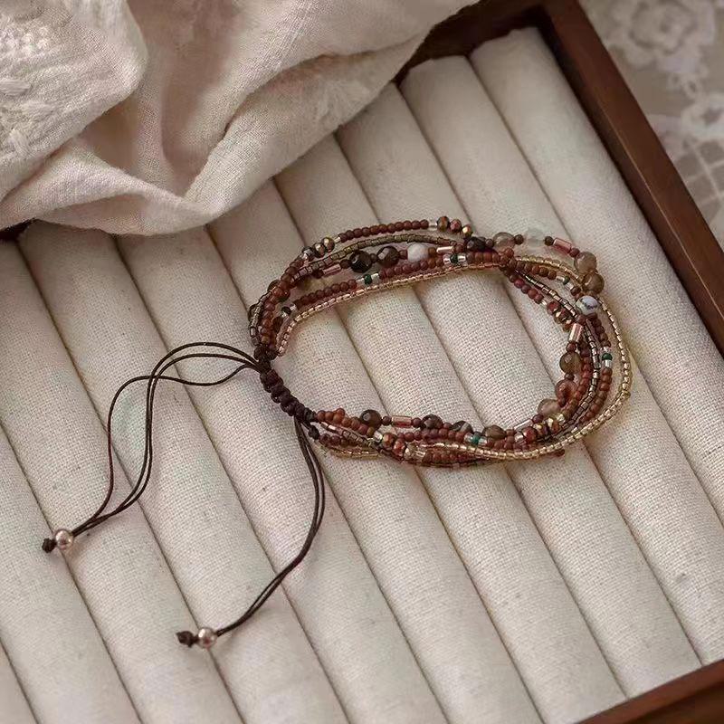 "Women's Multilayer Beaded Bracelet: Elegant Chinese Style, Adjustable Braided Design"