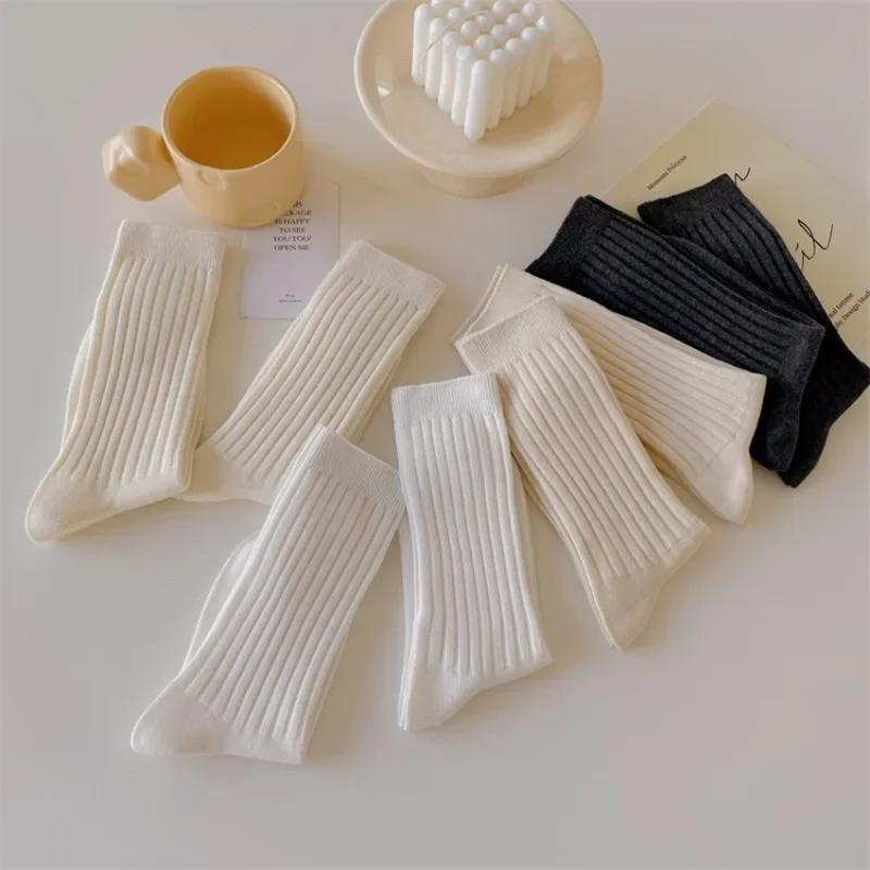 Chaussettes en Tricot de Coton pour Femmes Style Japonais Chaussettes Hautes pour Écolières Mode Coréenne Couleur Unie Noir Blanc Gris Chaussettes Longues