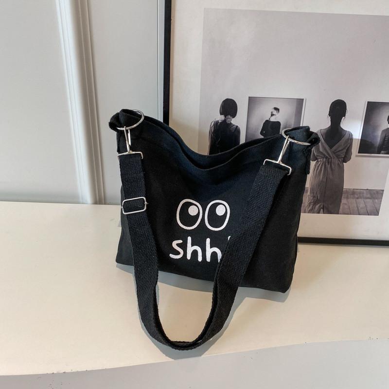 

2023 New Arrival Canvas Tote Bag With Simple And Casual Design Trendy Street Style Black Eyes