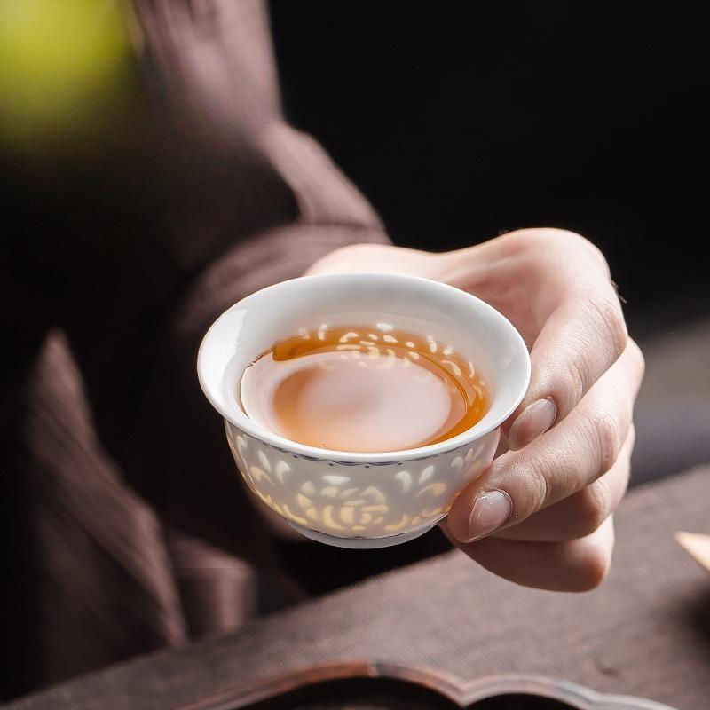 Hand drawn blue and white exquisite tea cup hollowed out ceramic Kung Fu single cup tea set teacup