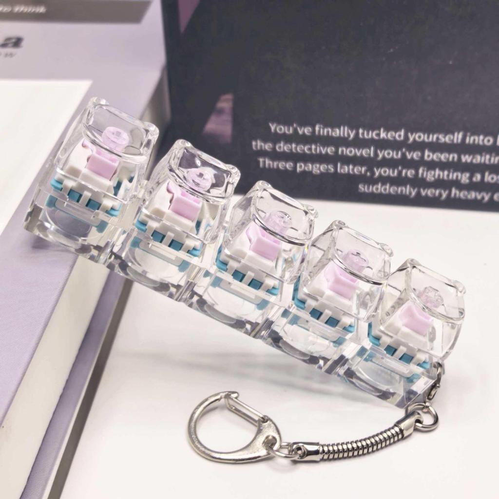 Stummer mechanischer Tastatur-Schlüsselanhänger mit 5,6 Kreuzachsen-Tasten und hochtransparenten Tastenkappen; Dekompression Spielzeug.