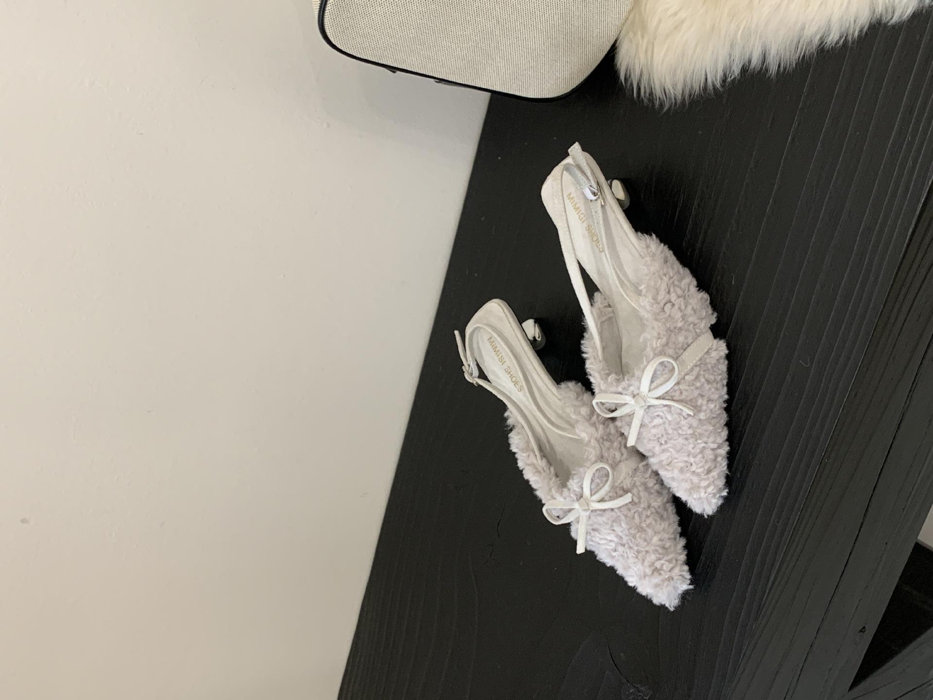 

2025 autumn and winter new pointed thin heel plush sandals European and American fashion bow sweet bag head high heel fluffy shoes 40