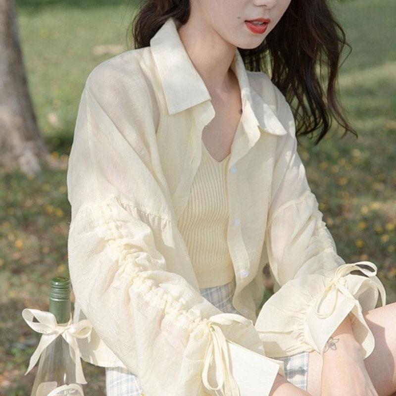 Manteau de protection solaire en mousseline de soie pour femme, style fin en été avec protection UV, un sens du design, une niche et un nouveau haut court