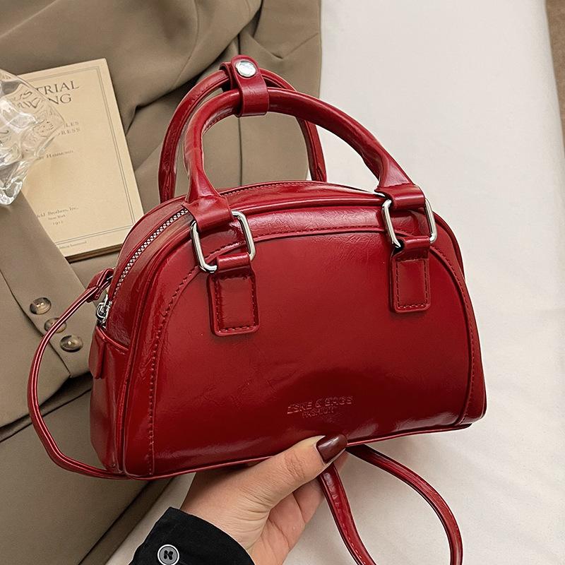 

2025 новый продукт повседневная маленькая свежая Оу Руофэн портативная сумка-бостон нишевая универсальная дорожная сумка премиум-класса